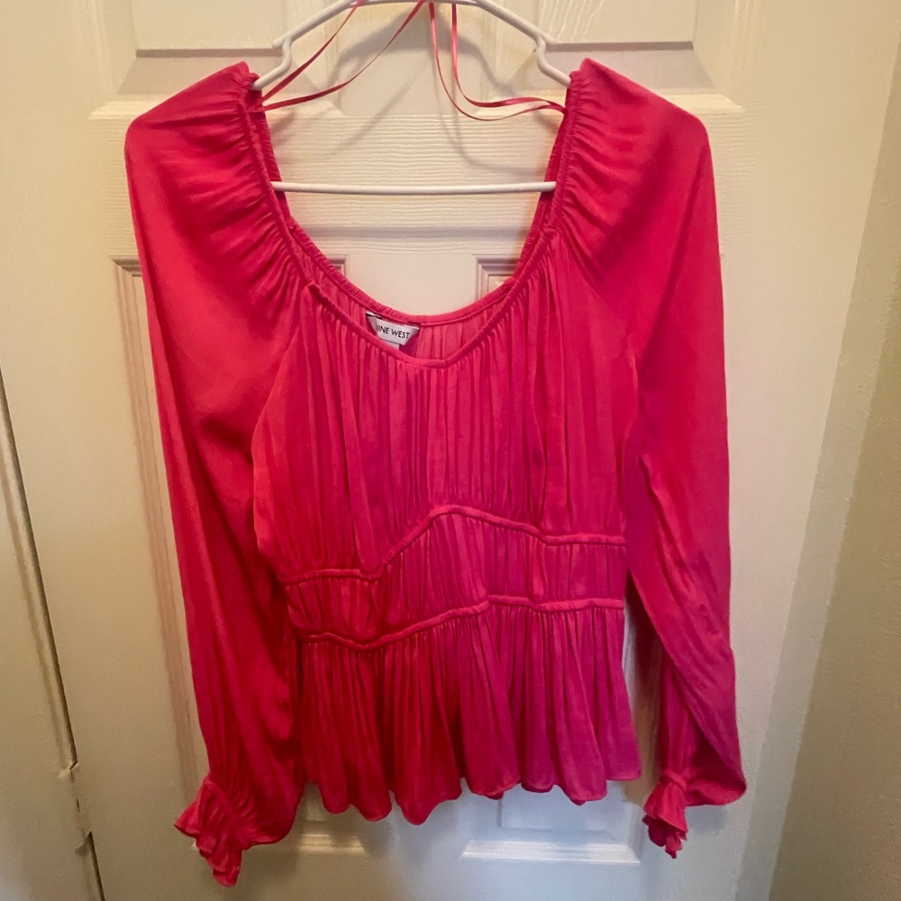 Hot pink top. Didn’t like the fit. Size medium